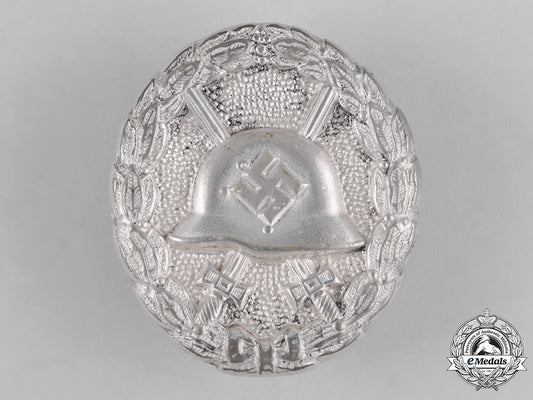 germany,_wehrmacht._a_silver_grade_condor_legion_wound_badge,_hollow_version_c18-043925_1