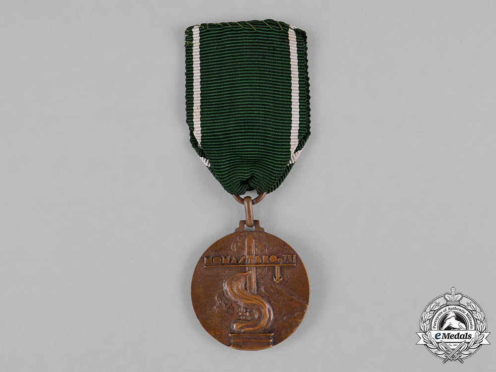 italy,_kingdom._a_medal_of_the38_th"_puglie"_mountain_infantry_division_for_the_albanian_and_greek_campaigns1941_c18-045244