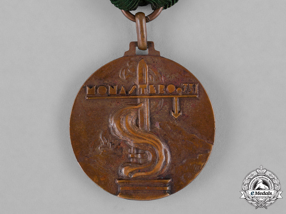italy,_kingdom._a_medal_of_the38_th"_puglie"_mountain_infantry_division_for_the_albanian_and_greek_campaigns1941_c18-045246
