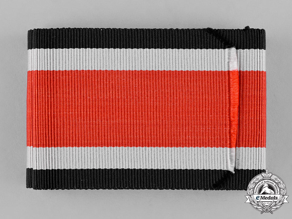 germany,_wehrmacht._an_unissued_original_ribbon_for_the1939_knight’s_cross_of_the_iron_cross_c18-045843