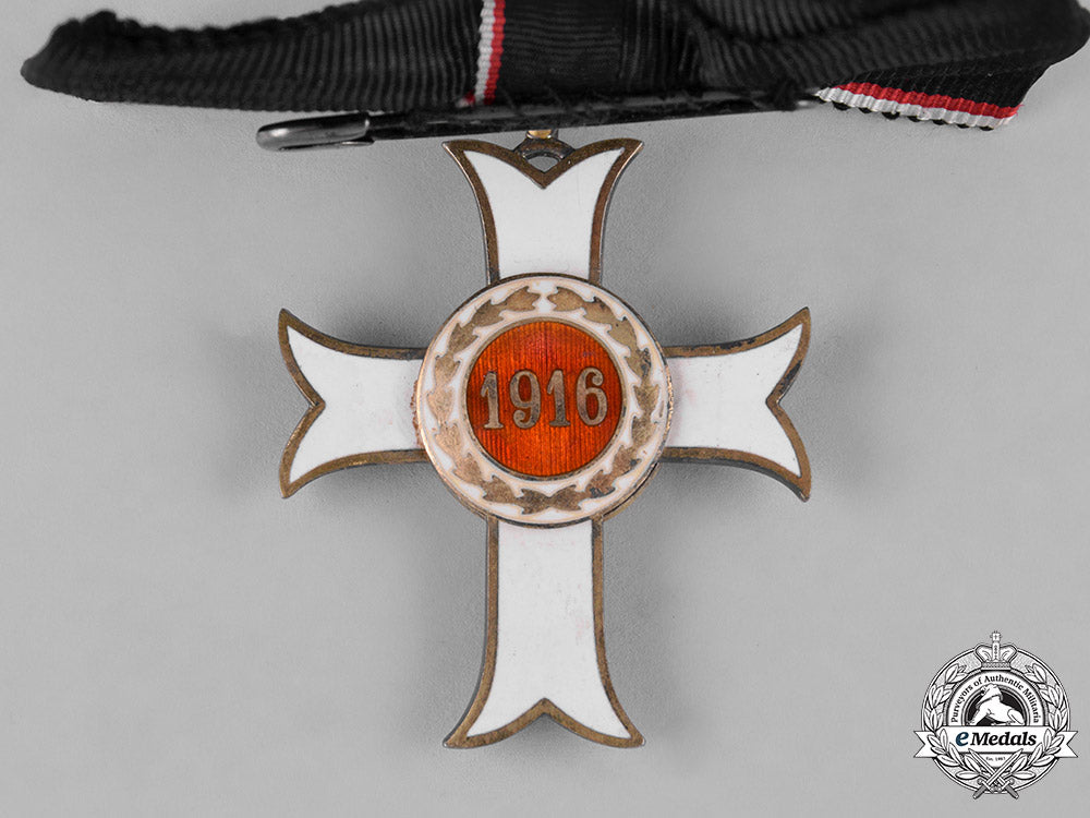 austria,_empire._an_order_of_the_knights_of_malta,_neck_badge_merit_cross_with_war_decoration,_c.1916_c18-046414