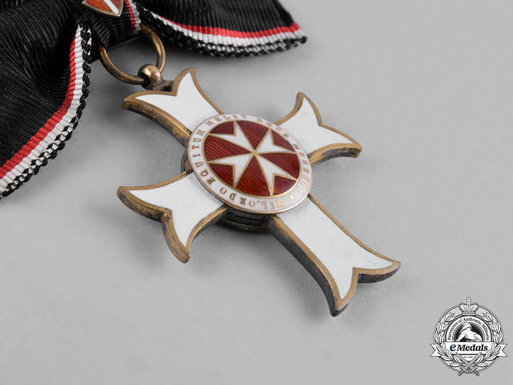 austria,_empire._an_order_of_the_knights_of_malta,_neck_badge_merit_cross_with_war_decoration,_c.1916_c18-046415