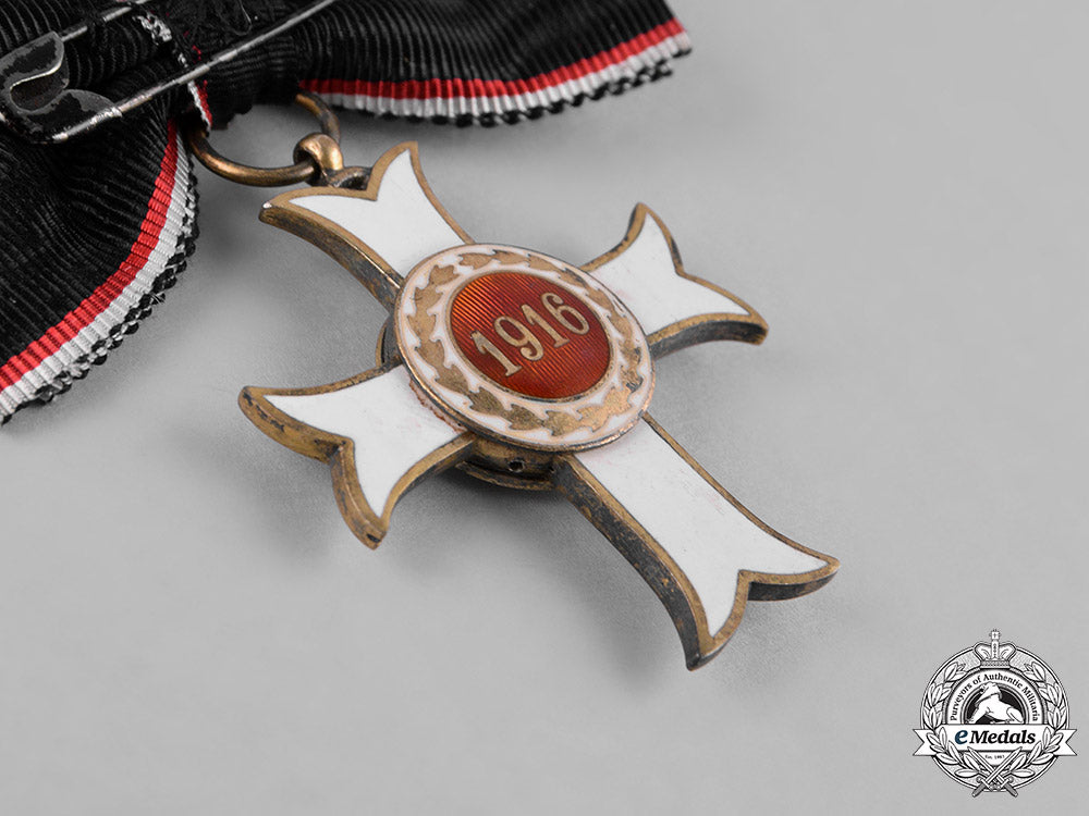 austria,_empire._an_order_of_the_knights_of_malta,_neck_badge_merit_cross_with_war_decoration,_c.1916_c18-046416