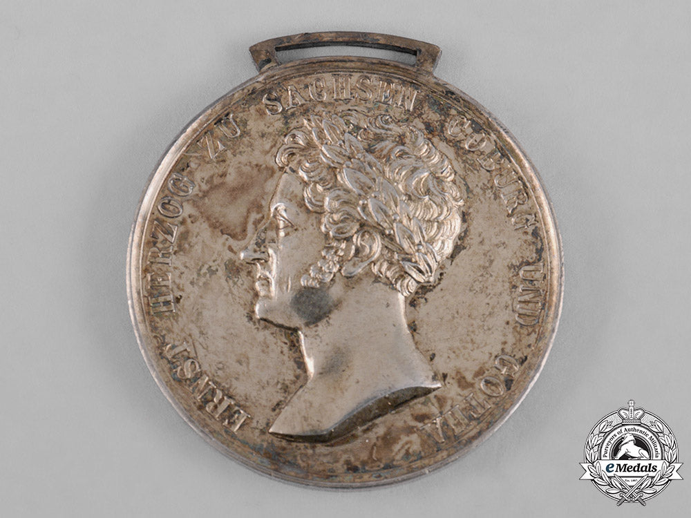 saxe-_coburg_and_gotha,_kingdom._a_saxe-_ernestine_house_order_merit_medal,_gold_medal,_c.1870_c18-048897