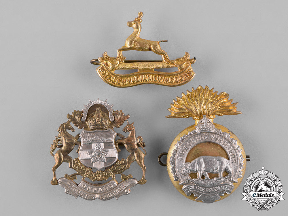 canada._a_lot_of_three_regimental_cap_badges,_c.1942_c18-049420