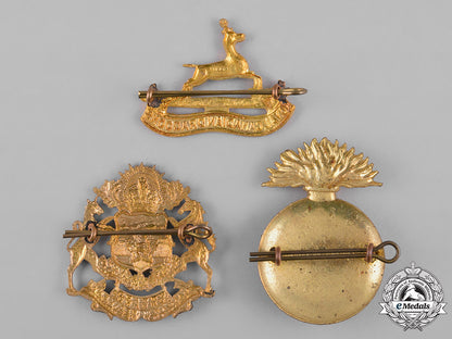 canada._a_lot_of_three_regimental_cap_badges,_c.1942_c18-049421