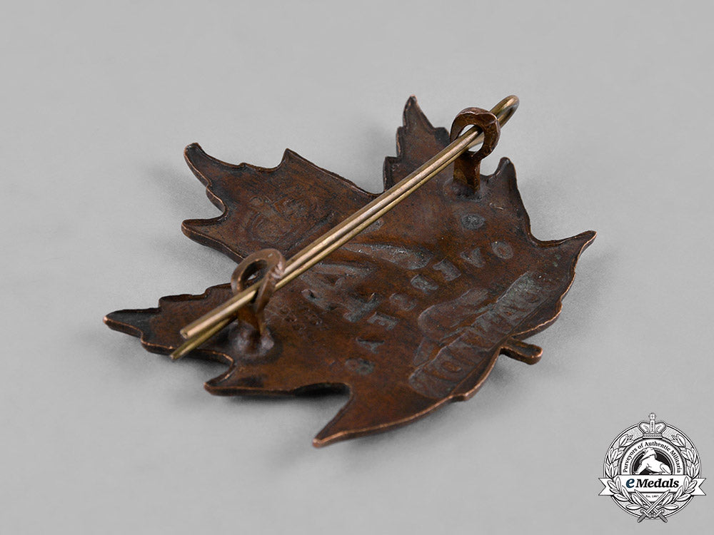canada._a74_th_infantry_battalion_cap_badge,_by_p.w.ellis,_c.1915_c18-049993
