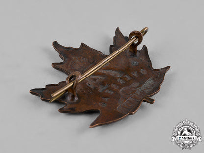 canada._a74_th_infantry_battalion_cap_badge,_by_p.w.ellis,_c.1915_c18-049993