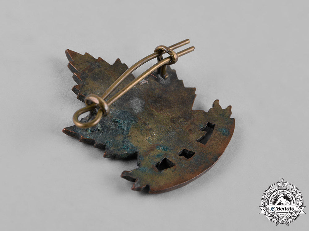 canada._a44_th&78_th_infantry_battalion_cap_badges_c18-050023