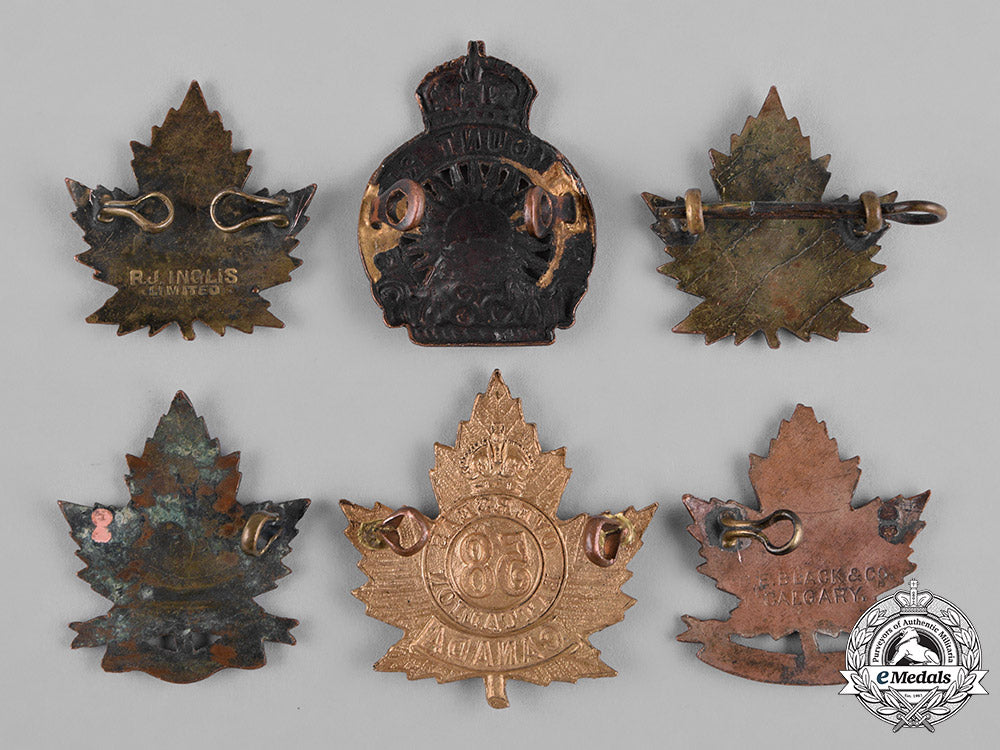 canada._a_lot_of_six_first_war_battalion_cap&_collar_badges_c18-050074