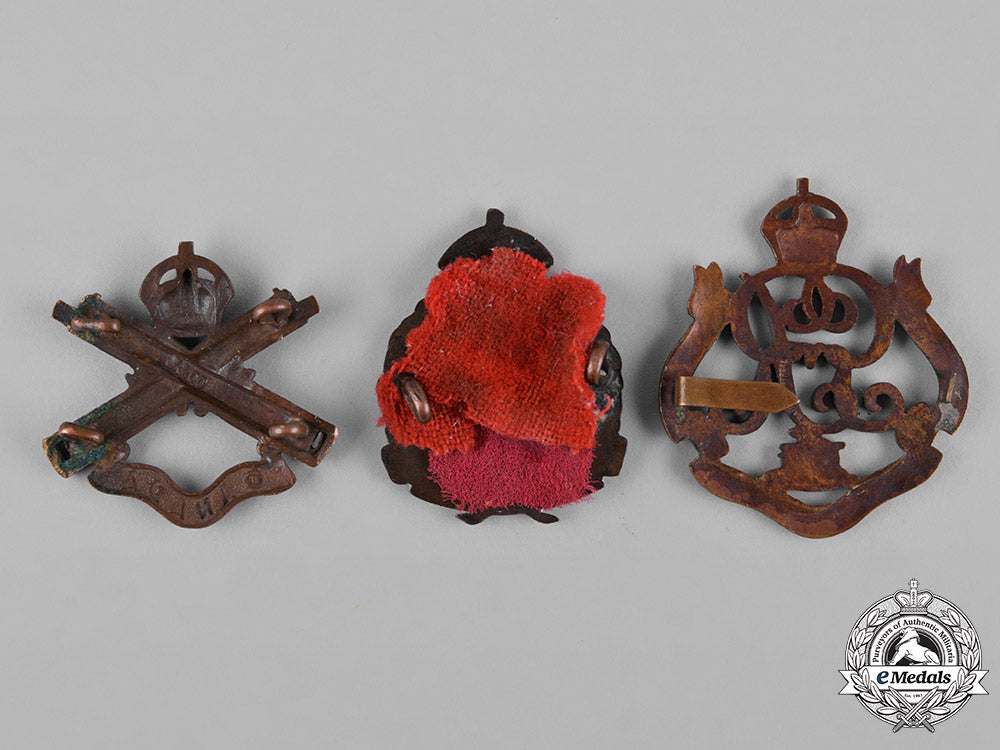 canada._a_lot_of_three_first_war_battalion_cap_badges_c18-050096