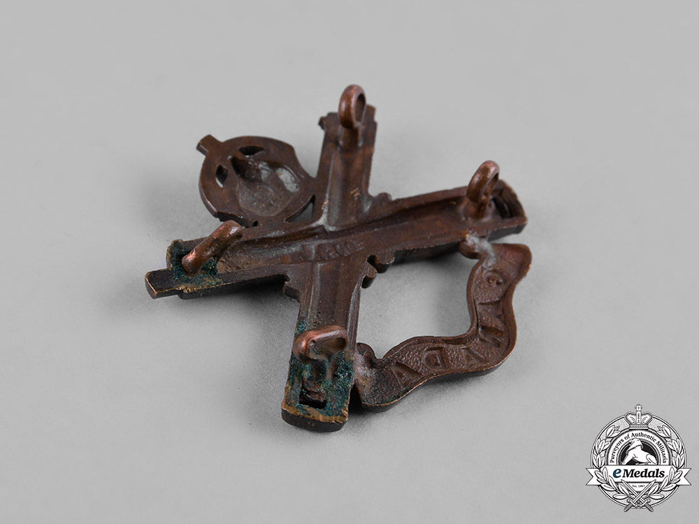 canada._a_lot_of_three_first_war_battalion_cap_badges_c18-050097