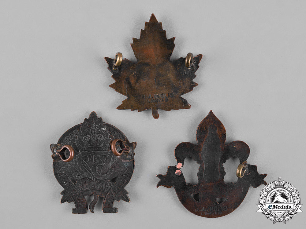 canada._a_lot_of_three_first_war_battalion_cap_badges_c18-050108