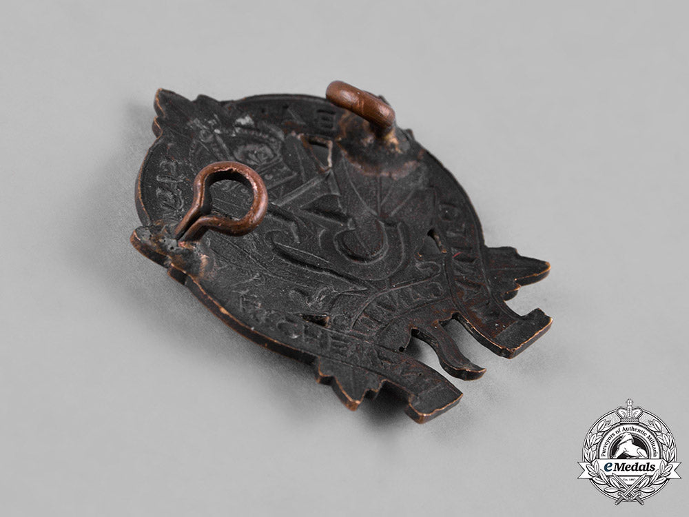 canada._a_lot_of_three_first_war_battalion_cap_badges_c18-050110