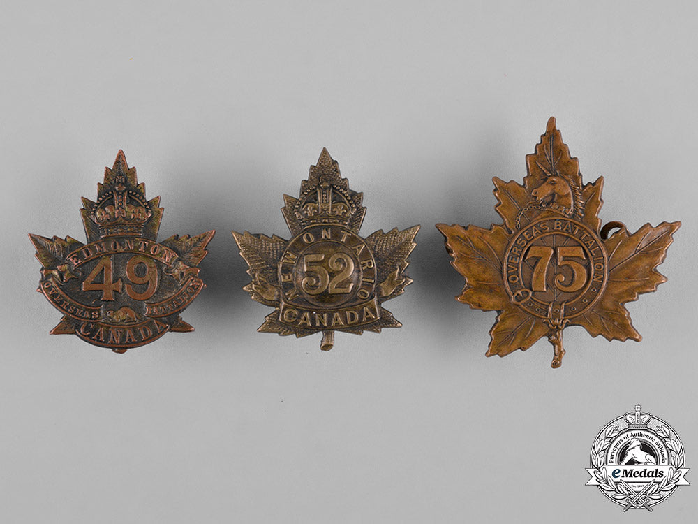 canada._a_lot_of_three_first_war_battalion_cap_badges_c18-050113