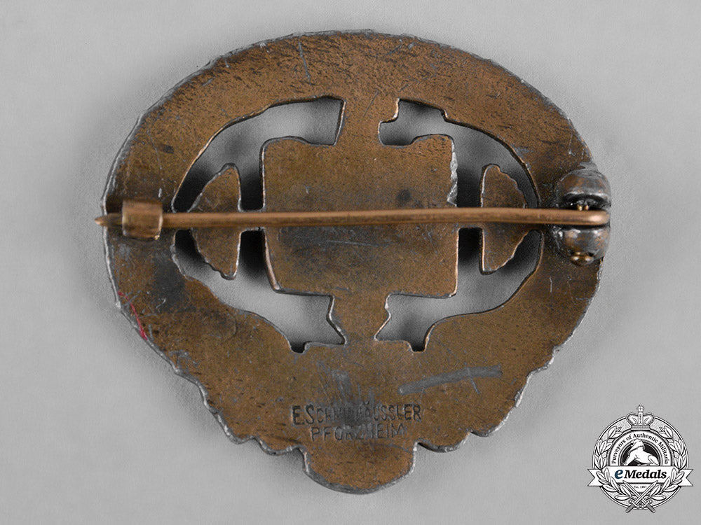 germany,_third_reich._a_heavy_athletics_badge,_i_class,_by_e._schmidhäussler_c18-050874