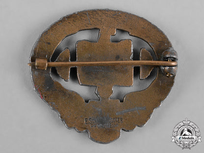 germany,_third_reich._a_heavy_athletics_badge,_i_class,_by_e._schmidhäussler_c18-050874