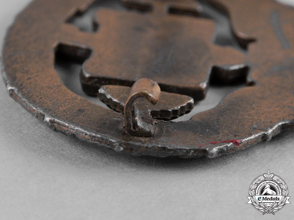 germany,_third_reich._a_heavy_athletics_badge,_i_class,_by_e._schmidhäussler_c18-050877