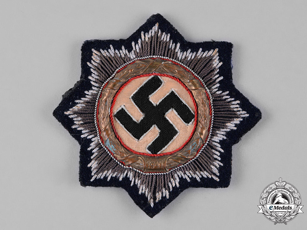 germany,_kriegsmarine._a_german_cross_in_gold,_to_lieutenant-_commander_friedrich_roll_c18-051825_1_1
