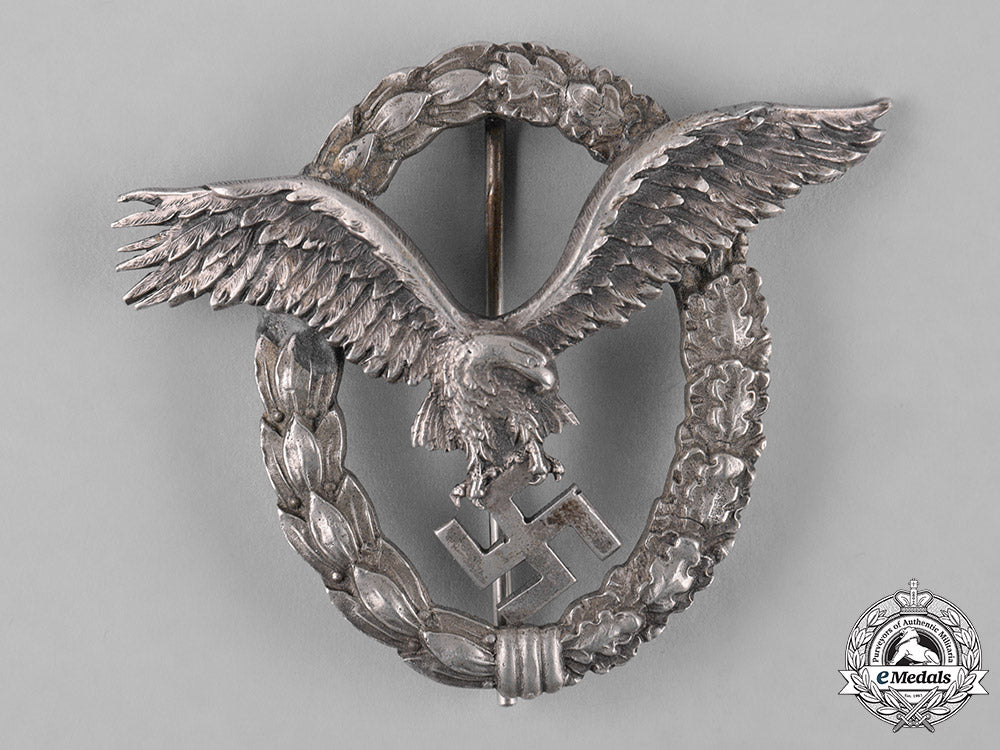 germany,_luftwaffe._an_early_field_repaired_pilot’s_badge,_by_c.e._juncker_c18-051975_1_1_1