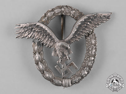 germany,_luftwaffe._an_early_field_repaired_pilot’s_badge,_by_c.e._juncker_c18-051975_1_1_1