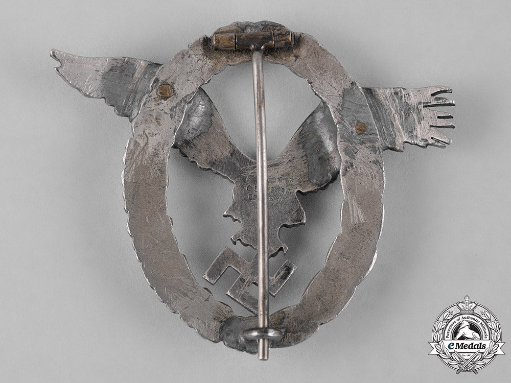 germany,_luftwaffe._an_early_field_repaired_pilot’s_badge,_by_c.e._juncker_c18-051976_1_1_1