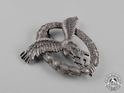 germany,_luftwaffe._an_early_field_repaired_pilot’s_badge,_by_c.e._juncker_c18-051977_1_1_1