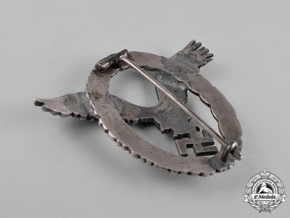 germany,_luftwaffe._an_early_field_repaired_pilot’s_badge,_by_c.e._juncker_c18-051978_1_1_1