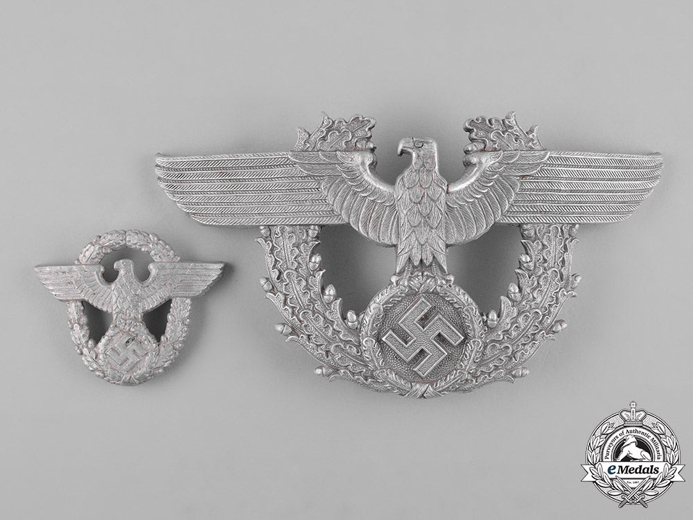 germany,_ordnungspolizei._a_pair_of(_order_police)_cap_insignia_c18-053250