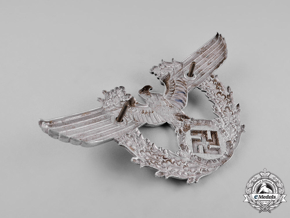 germany,_ordnungspolizei._a_pair_of(_order_police)_cap_insignia_c18-053254