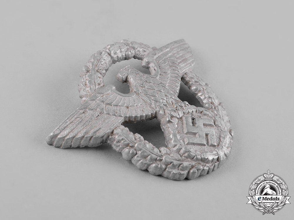 germany,_ordnungspolizei._a_pair_of(_order_police)_cap_insignia_c18-053257