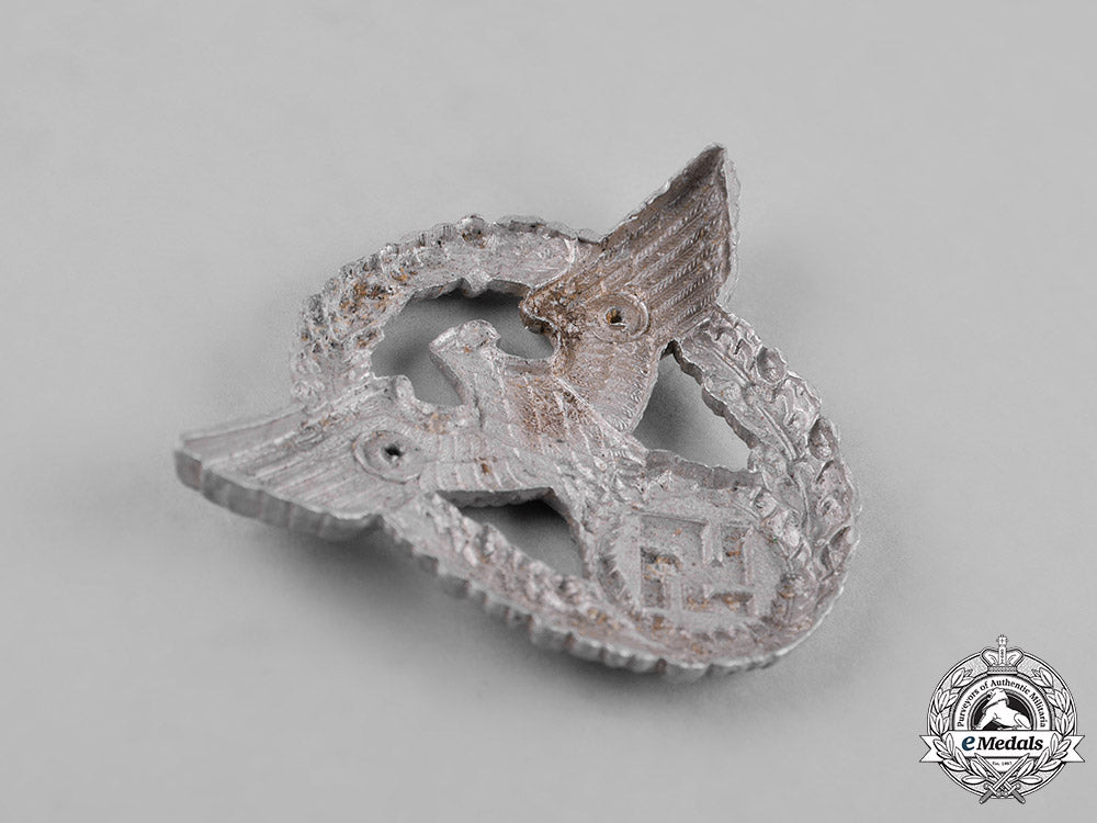 germany,_ordnungspolizei._a_pair_of(_order_police)_cap_insignia_c18-053258