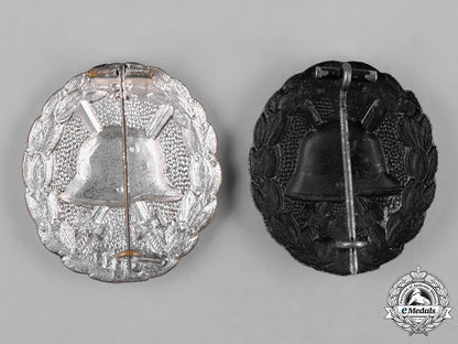 germany,_imperial._a_pair_of_wound_badges,_silver_and_black_grades,_and_a_stickpin_c18-053540