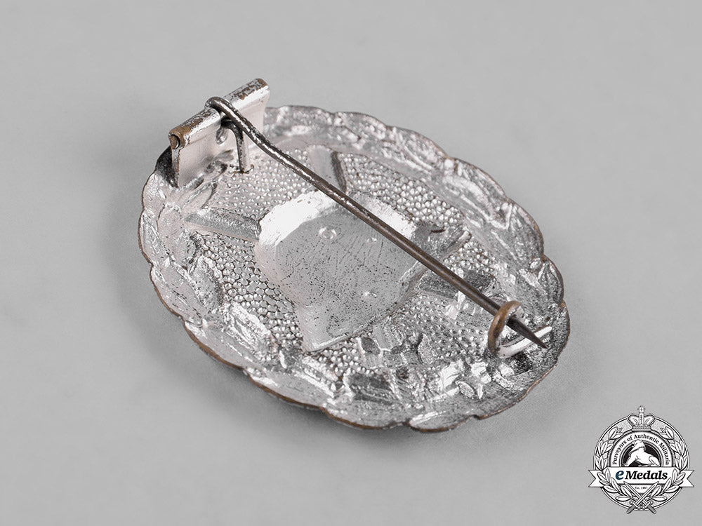 germany,_imperial._a_pair_of_wound_badges,_silver_and_black_grades,_and_a_stickpin_c18-053541