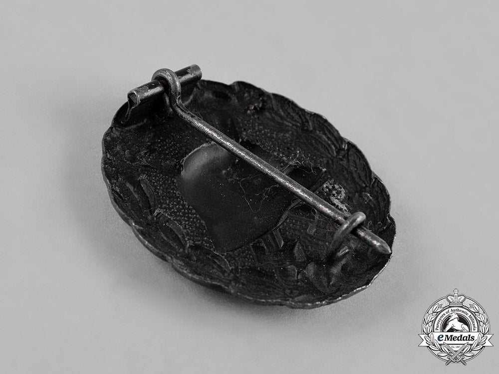 germany,_imperial._a_pair_of_wound_badges,_silver_and_black_grades,_and_a_stickpin_c18-053544