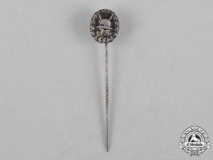 germany,_imperial._a_pair_of_wound_badges,_silver_and_black_grades,_and_a_stickpin_c18-053548