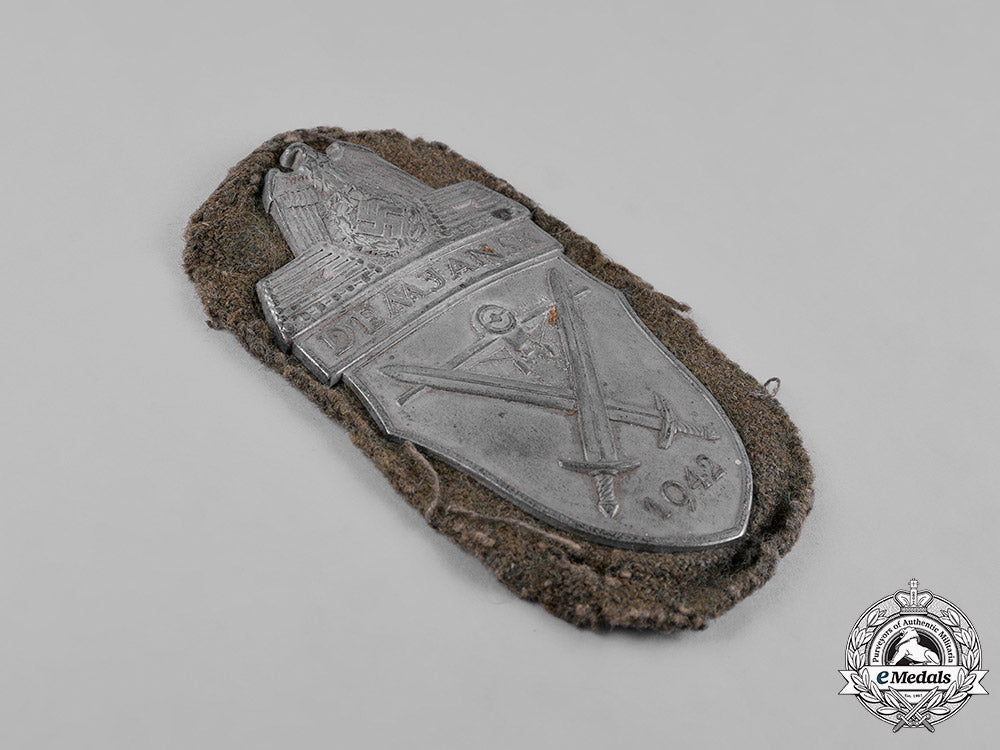 germany,_wehrmacht._an_army_issued_demjansk_shield_c18-053552