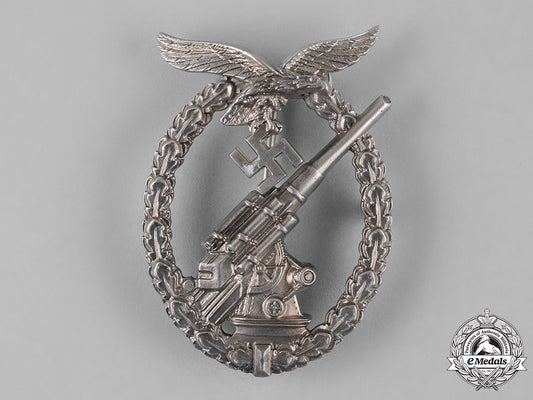 germany,_luftwaffe._a_flak_badge,_by_c.e._juncker_c18-054588