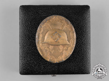 germany,_wehrmacht._a_cased_wound_badge,_gold_grade,_by_wilhelm_deumer_c18-055067