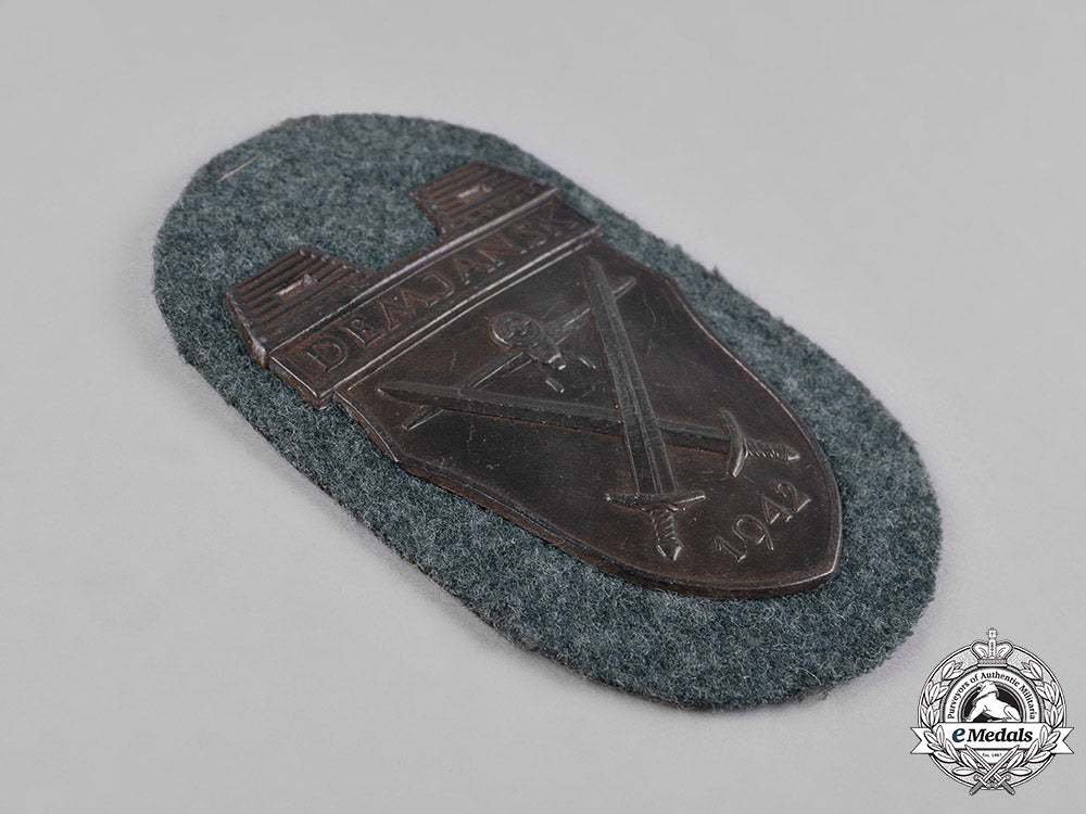 germany,_heer._an_army_issue_demjansk_shield,1957_issue_c18-055217