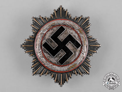 germany,_wehrmacht._a_german_cross_in_silver,_by_c.f._zimmermann_c18-056647