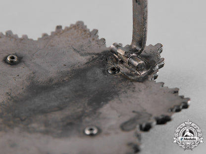 germany,_wehrmacht._a_german_cross_in_silver,_by_c.f._zimmermann_c18-056652