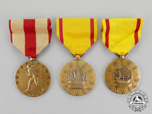 united_states._a_lot_of_three_service_medals_c18-086
