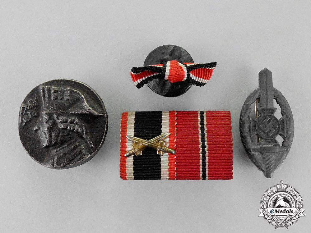 germany._four_first_and_second_war_period_badges,_pins,_and_insignia_c18-1448