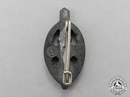 germany._four_first_and_second_war_period_badges,_pins,_and_insignia_c18-1450