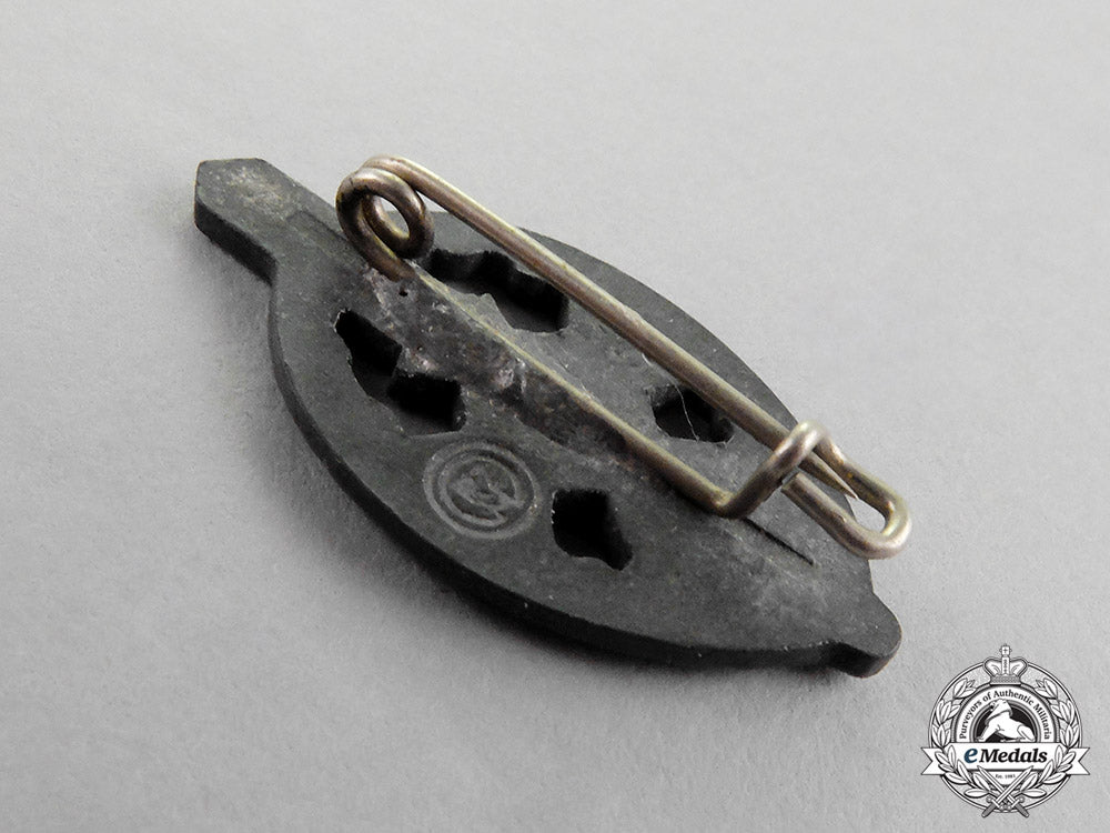 germany._four_first_and_second_war_period_badges,_pins,_and_insignia_c18-1451
