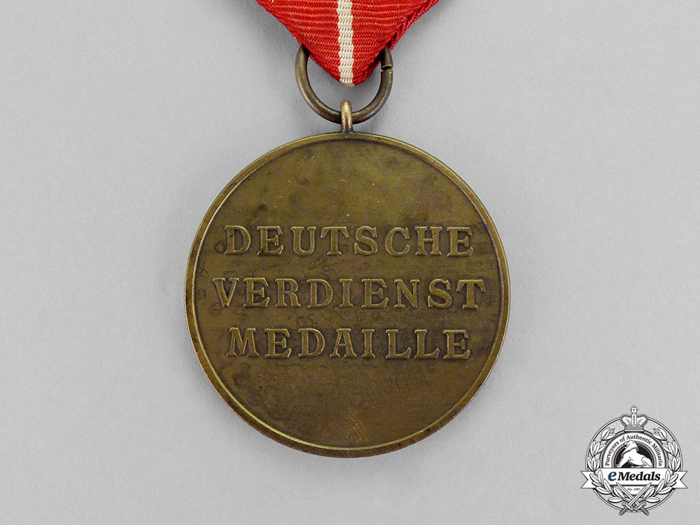 germany,_third_reich._a_packeted_order_of_the_german_eagle_bronze_merit_medal_by_the_vienna_mint_c18-348