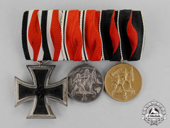 Germany. An Ek2 Medal Bar With Three Medals, Awards, And Decorations
