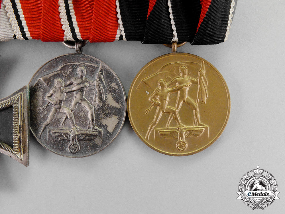 germany._an_ek2_medal_bar_with_three_medals,_awards,_and_decorations_c18-665