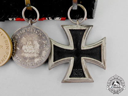 germany._an_ek2_medal_bar_with_three_medals,_awards,_and_decorations_c18-667